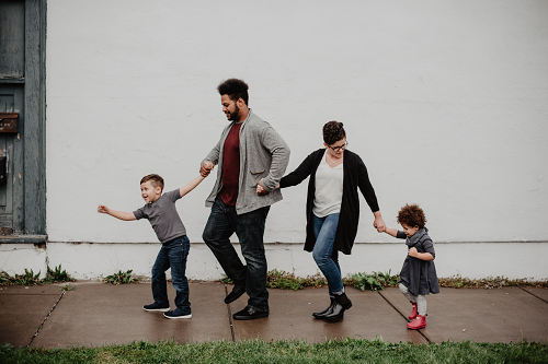 a family with children walking together